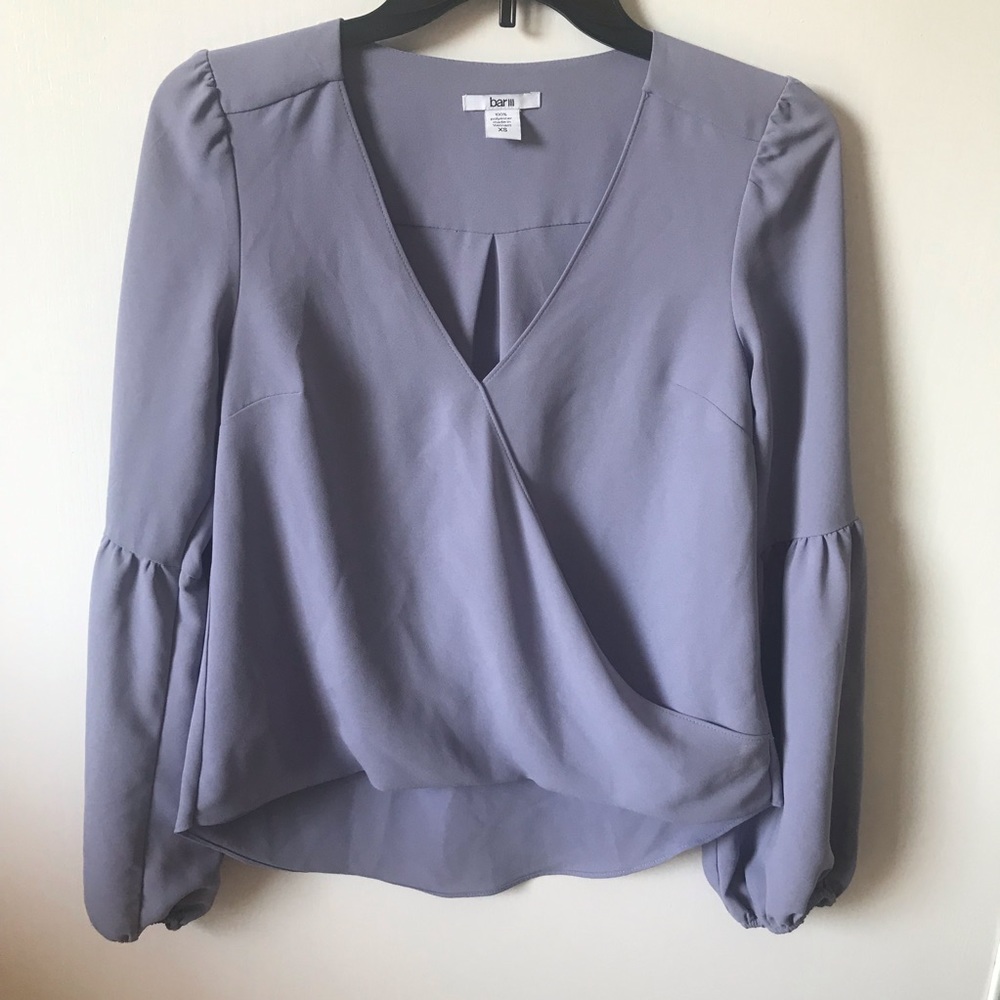 Lilac color, long sleeve blouse.